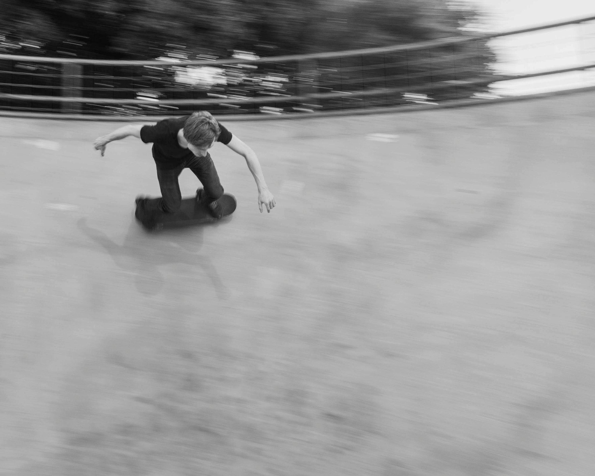 Person skateboarding on a smooth surface with blurred background